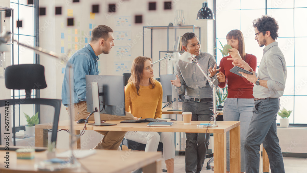 group of employes in a stylish office working on a customer journey mapping project